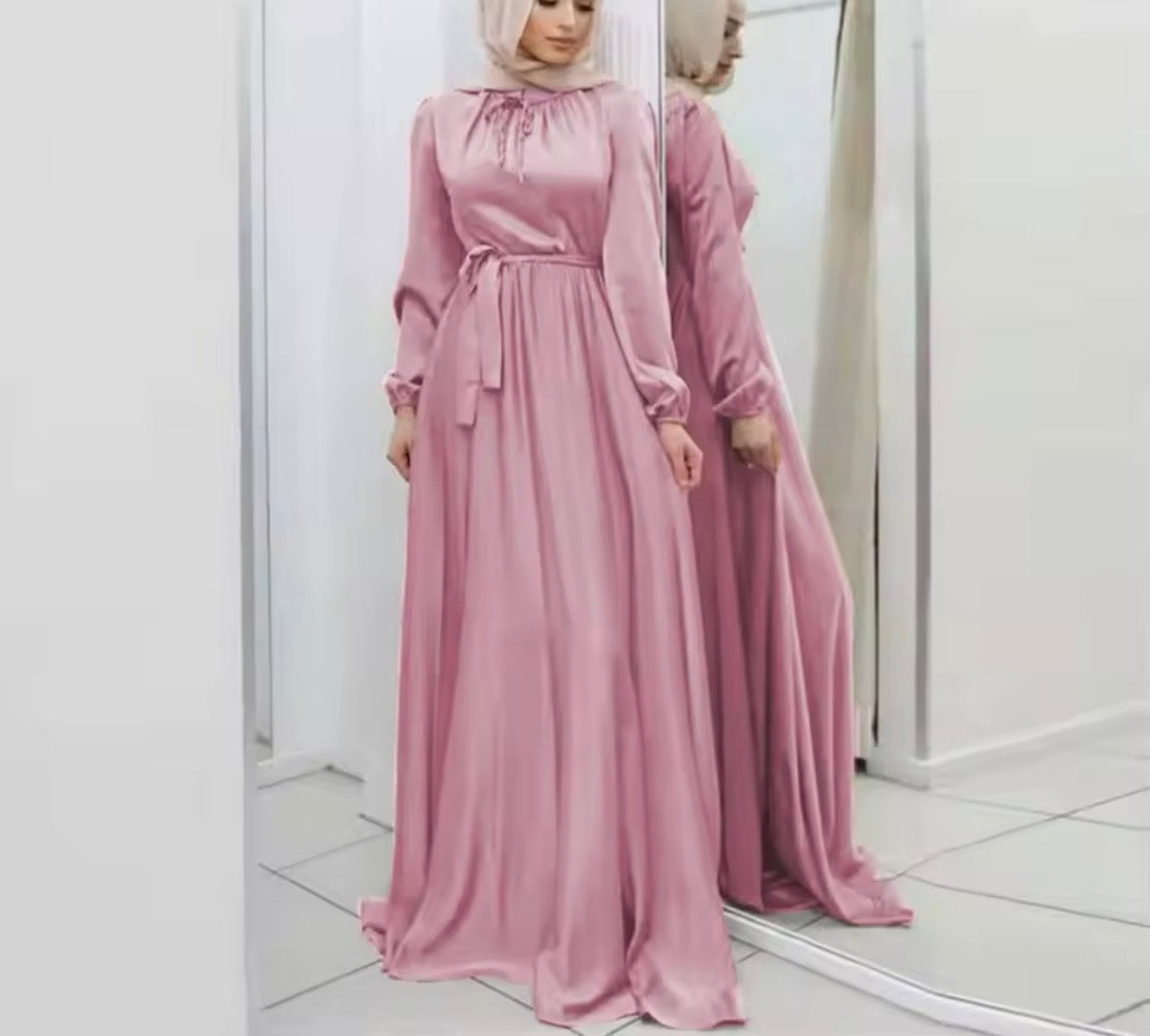 Satin dress embodies modest fashion Whit hijab