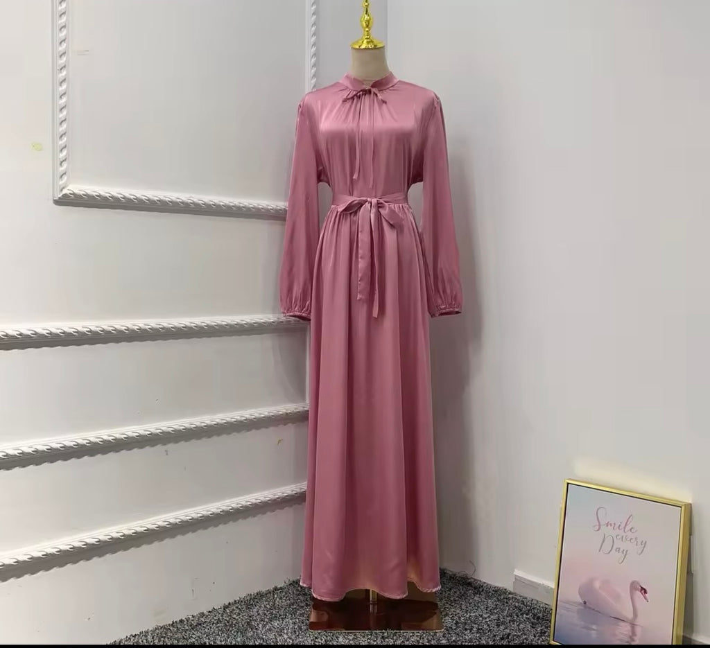 Satin dress embodies modest fashion Whit hijab