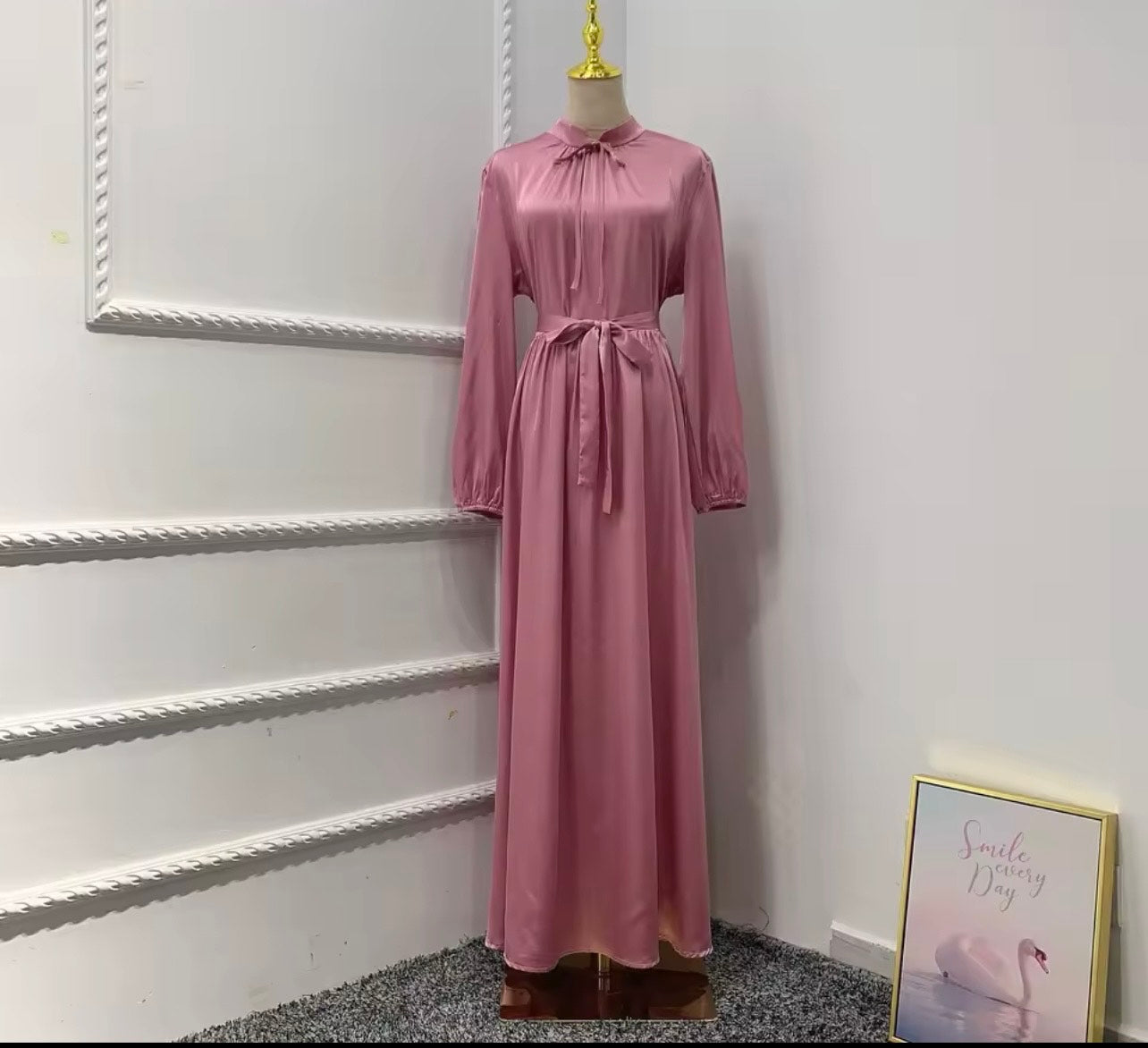 Satin dress embodies modest fashion Whit hijab